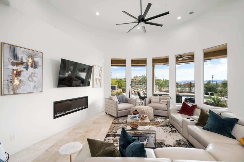 A spacious living room upstairs to watch your favorite shows, or just sit by the fire and enjoy the views.