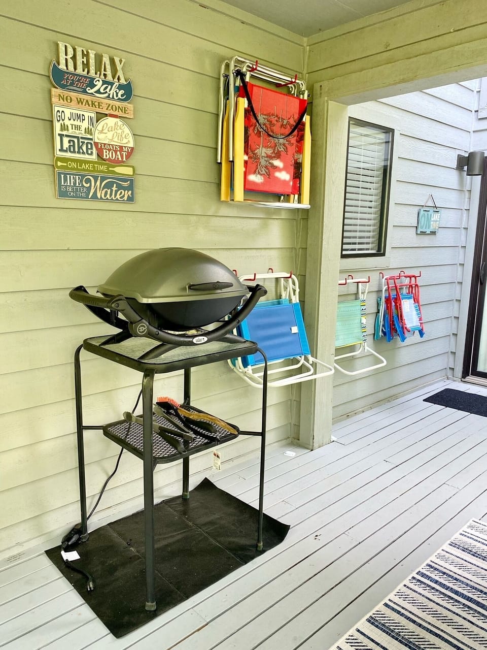 Grill on side deck of condo