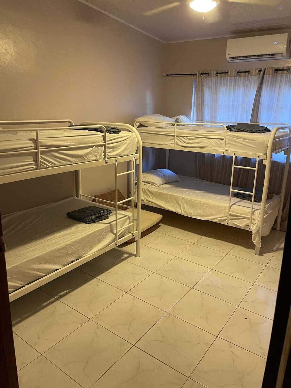 Guest room with 2 sets of single bunk beds