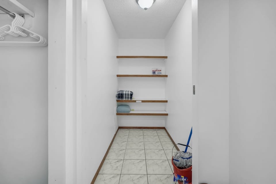 Large storage room with extra blankets, first aid kit