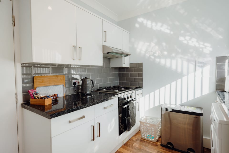 There's a full fitted kitchen with machine machine and microwave