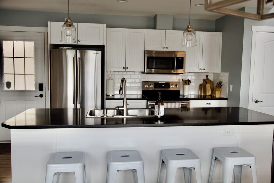 spacious kitchen with large island. 