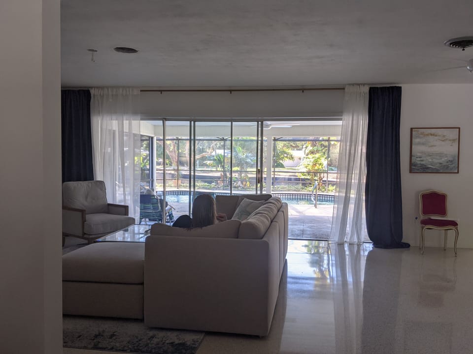 14' glass sliders open to fully integrate indoor and outdoor living spaces. 