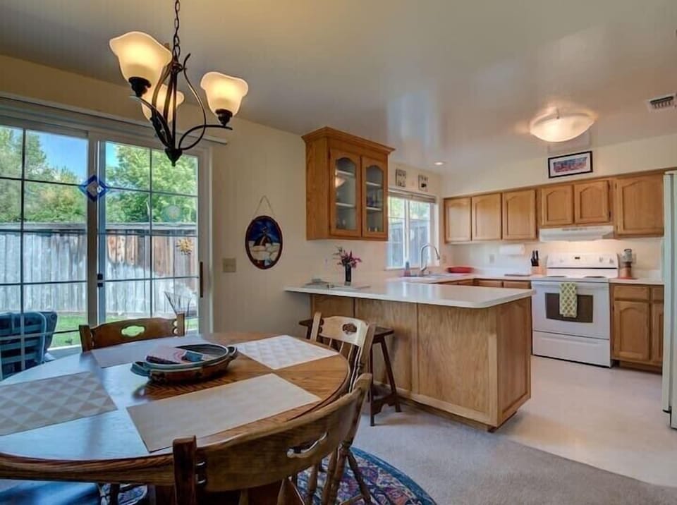 Hardwood table with seating for 4.