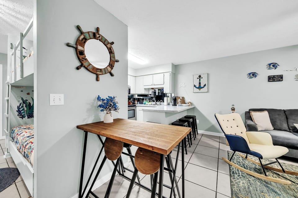 Dining table chairs fold in and out.