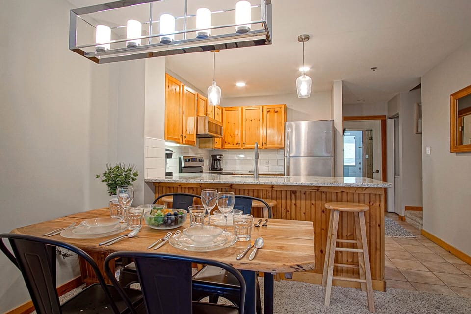 The kitchen bar has seating for 3.