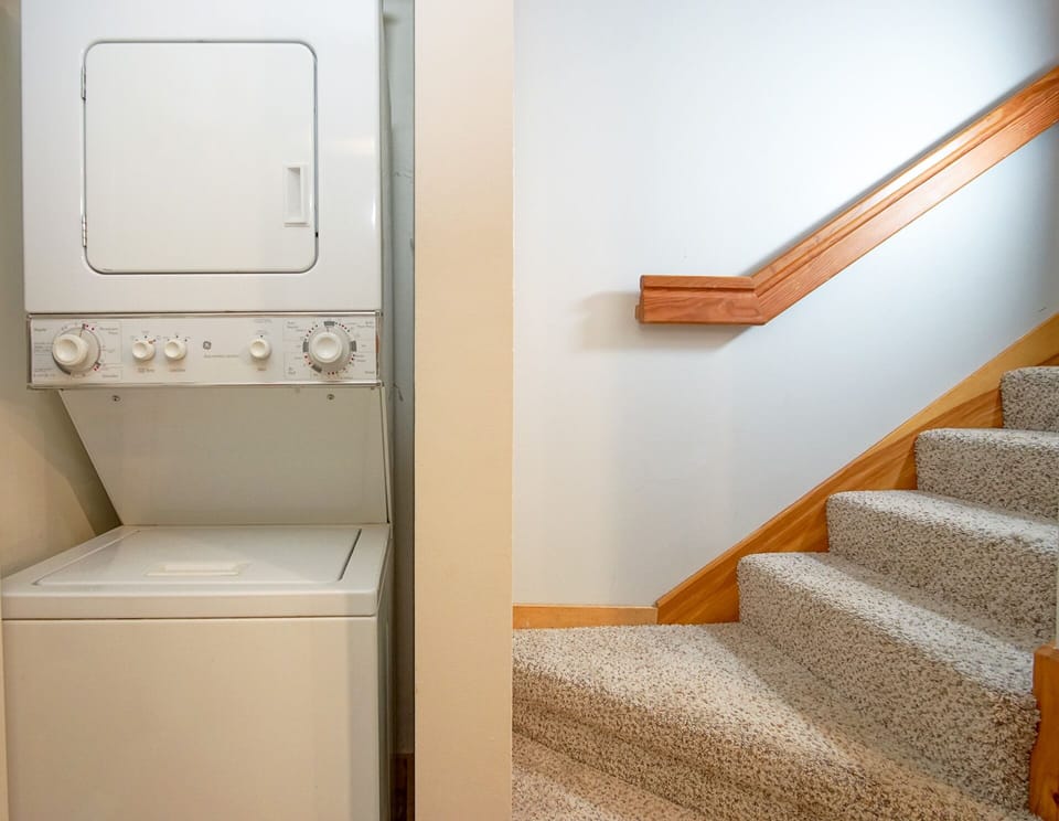 The washer and dryer are located in the entry.