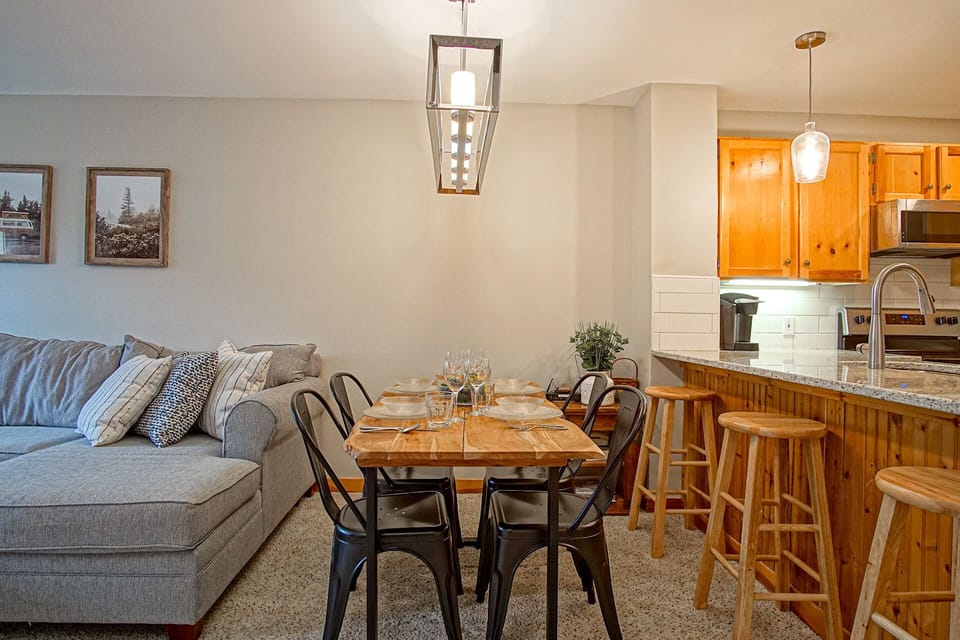 The dining room table seats 4.