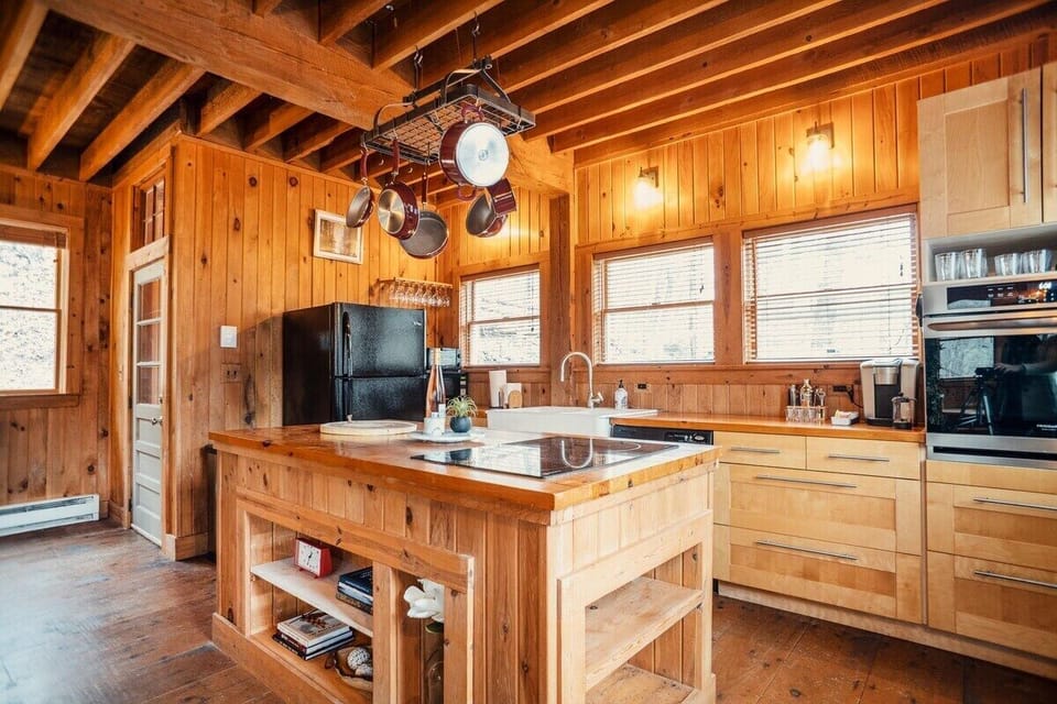 Leave your spatula at home! We have you covered with all the kitchen essentials you may need.  With plenty of counter space, induction stove top, farmhouse sink, and top of the line appliances the kitchen is sure to spark new creative dishes.