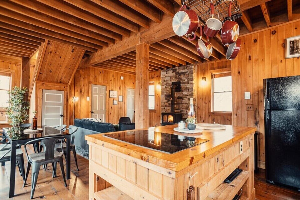 The open floor plan of the main floor creates an amazing open feel.  With sunlight beaming from the many windows, this picture perfect environment is sure to delight.