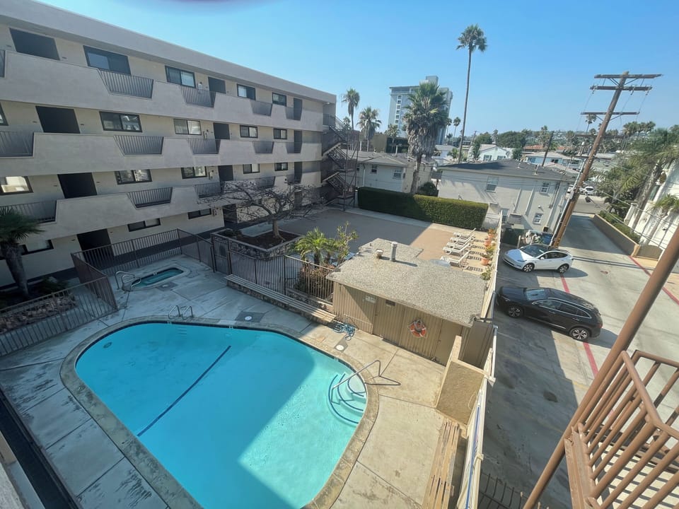 Pool, hot tub and courtyard