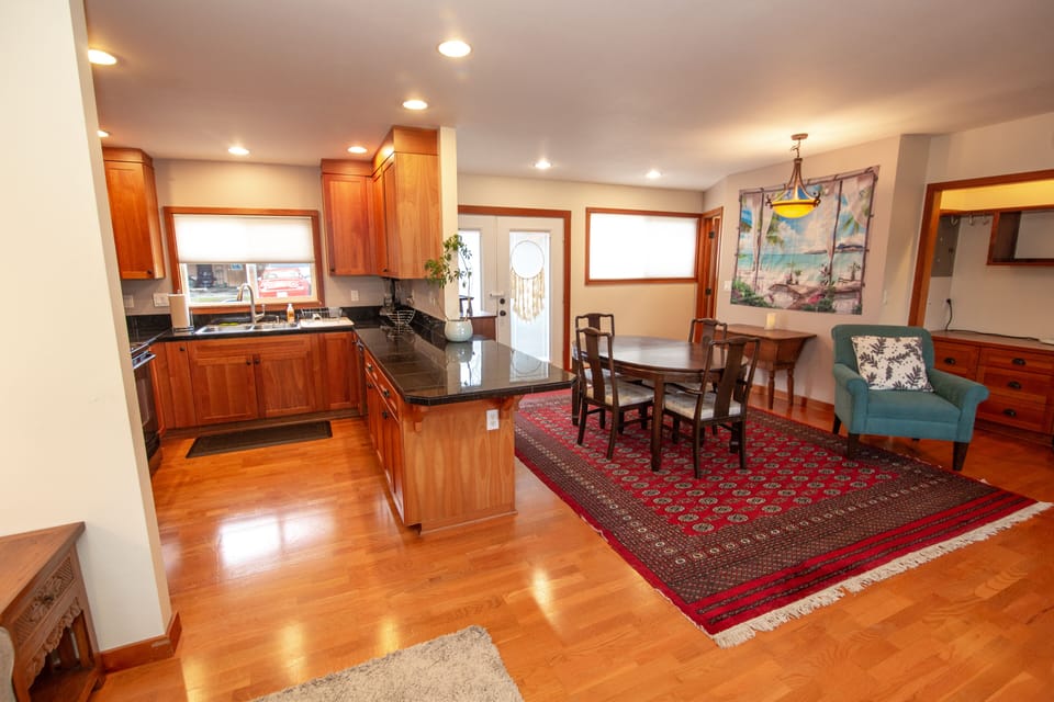 View from couch, looking at Dining Room & kitchen