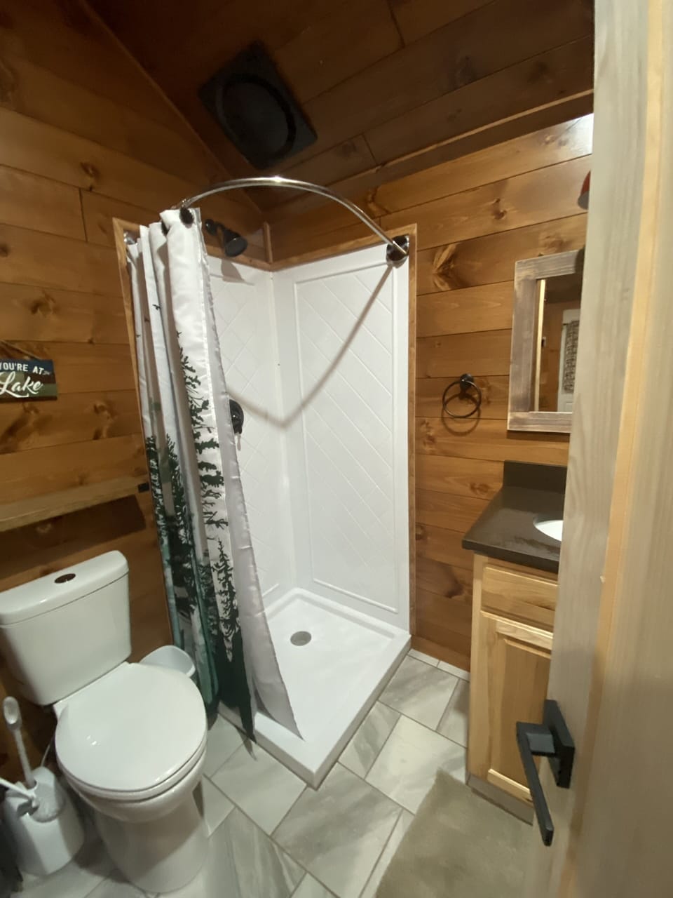 Spacious bathroom with shower. 