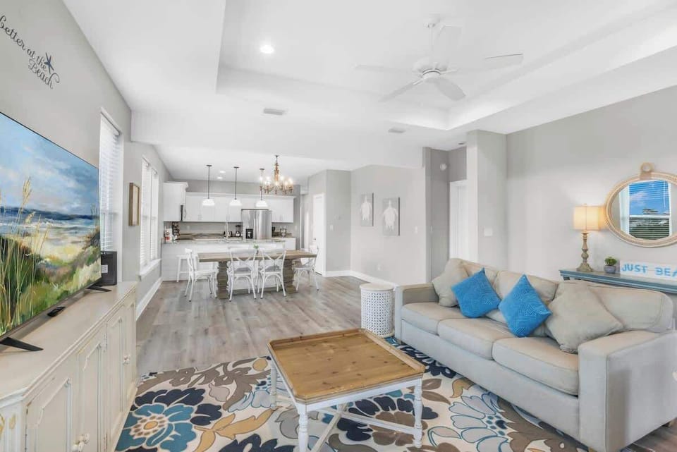 Bright and beachy. You will feel like you are at the beach the moment you step inside. 