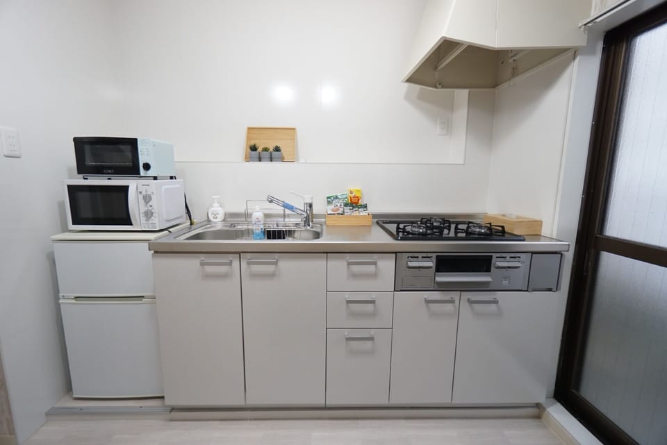 Kitchen refrigerator, microwave oven, toaster