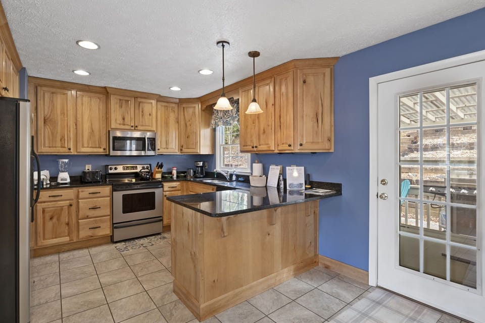 Well appointed kitchen is open to living area. 