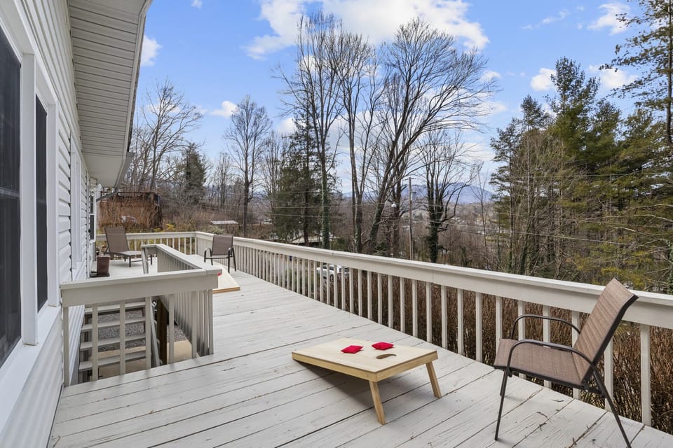Expansive front deck with mountain views.