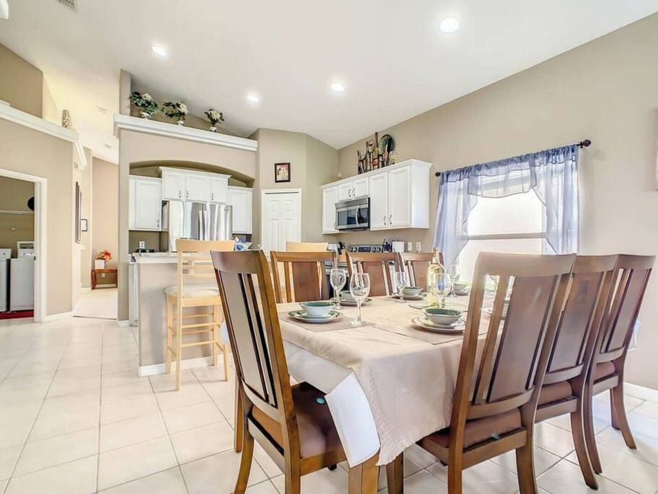 Enjoy family meals in this bright and elegant dining space with plenty of seating.