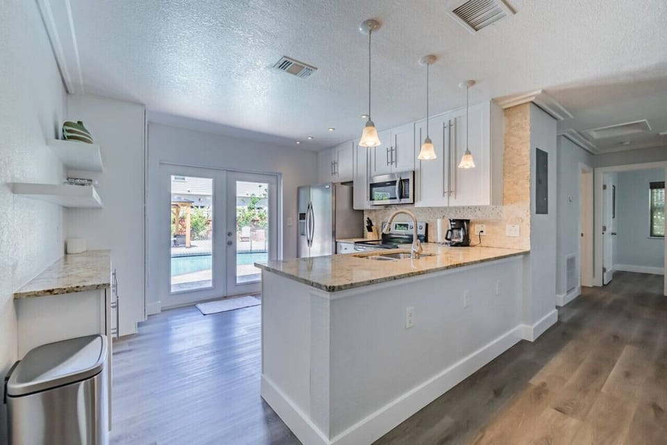 Open Kitchen Layout & Wine Glass Display