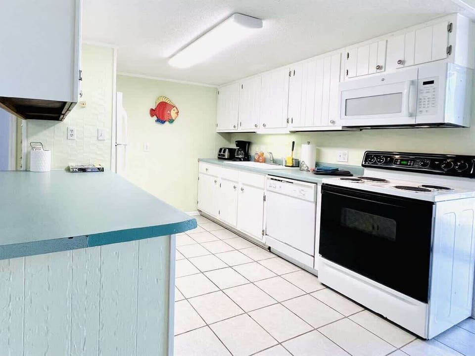 A modern kitchen that lets you cook like you never left home.

