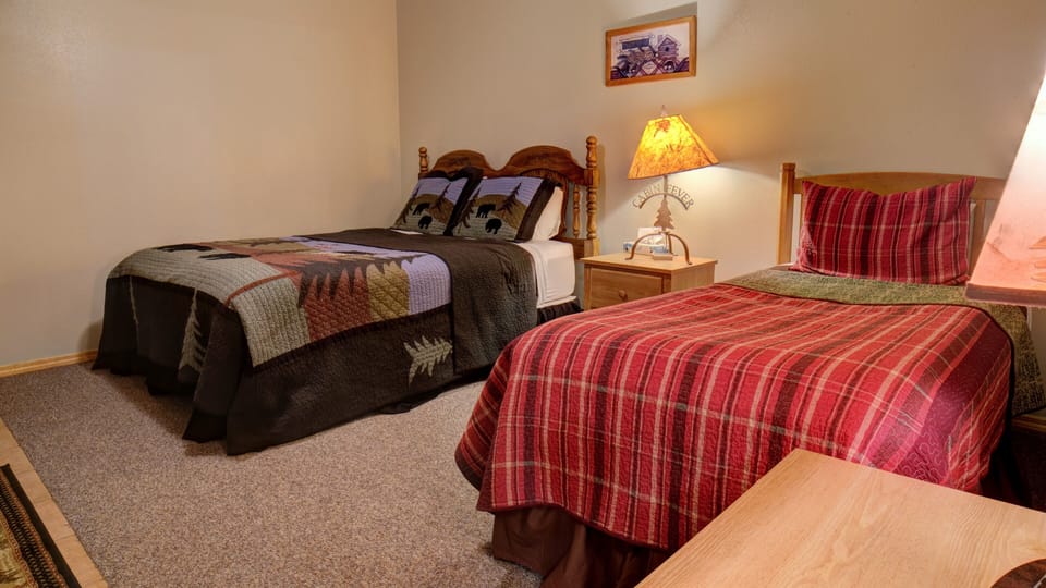 This room has a full bed and a twin bed.