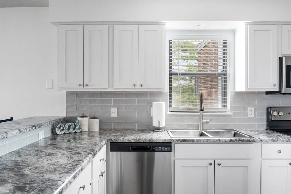 Kitchen with dishwasher.