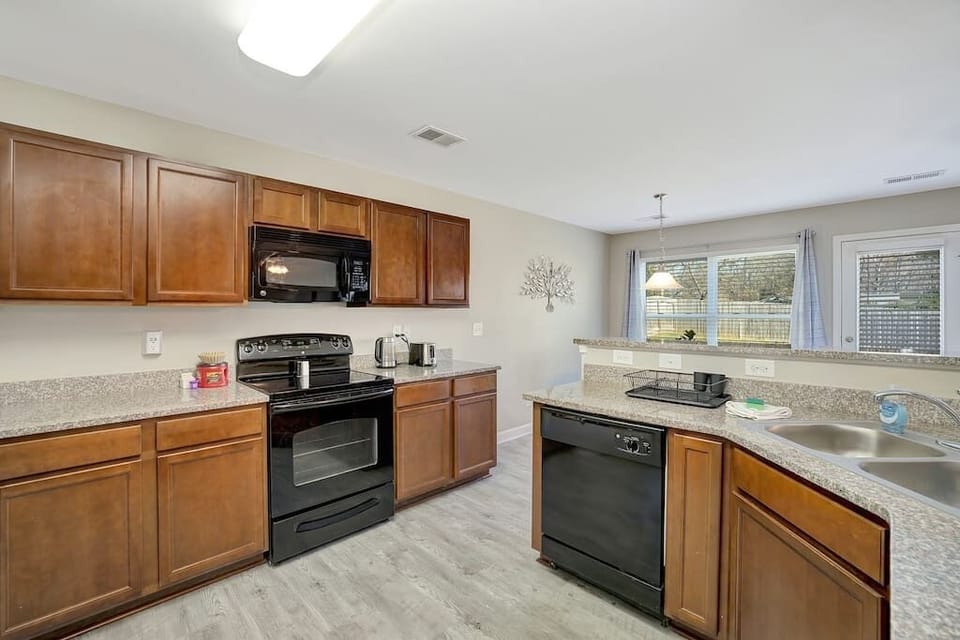 Kitchen is stocked with basic cooking items for a delicious meal. Coffee included.