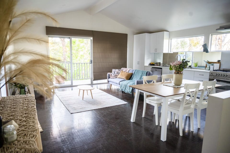 Large upstairs living/dining/kitchen amongst the trees