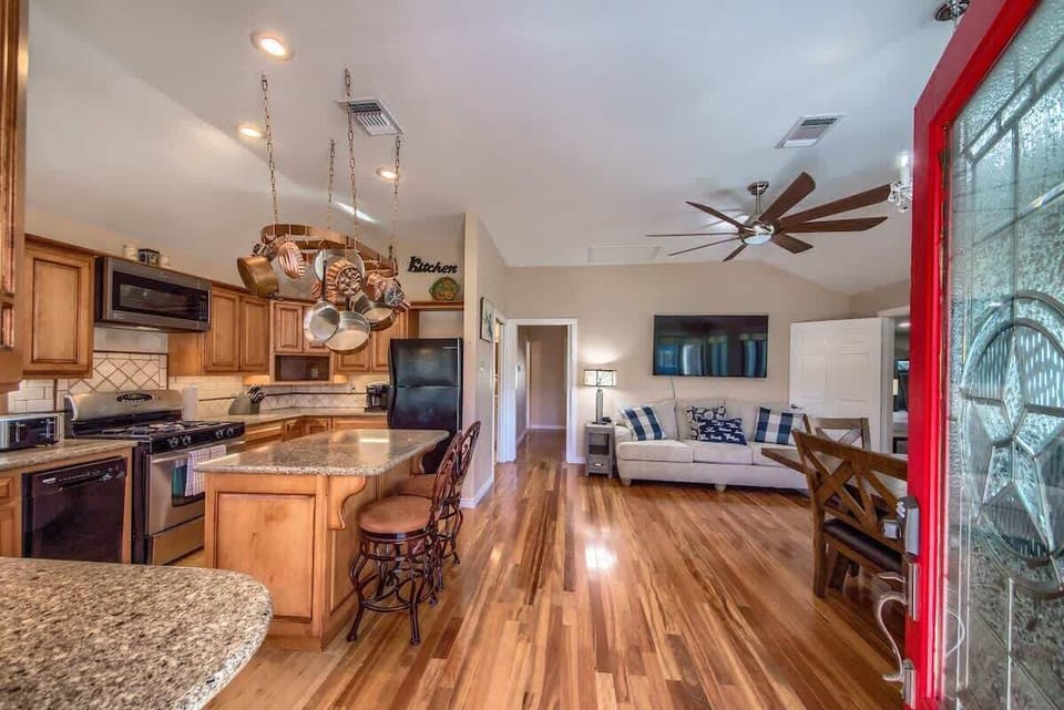 Living room and kitchen are open to each other and great for entertaining.