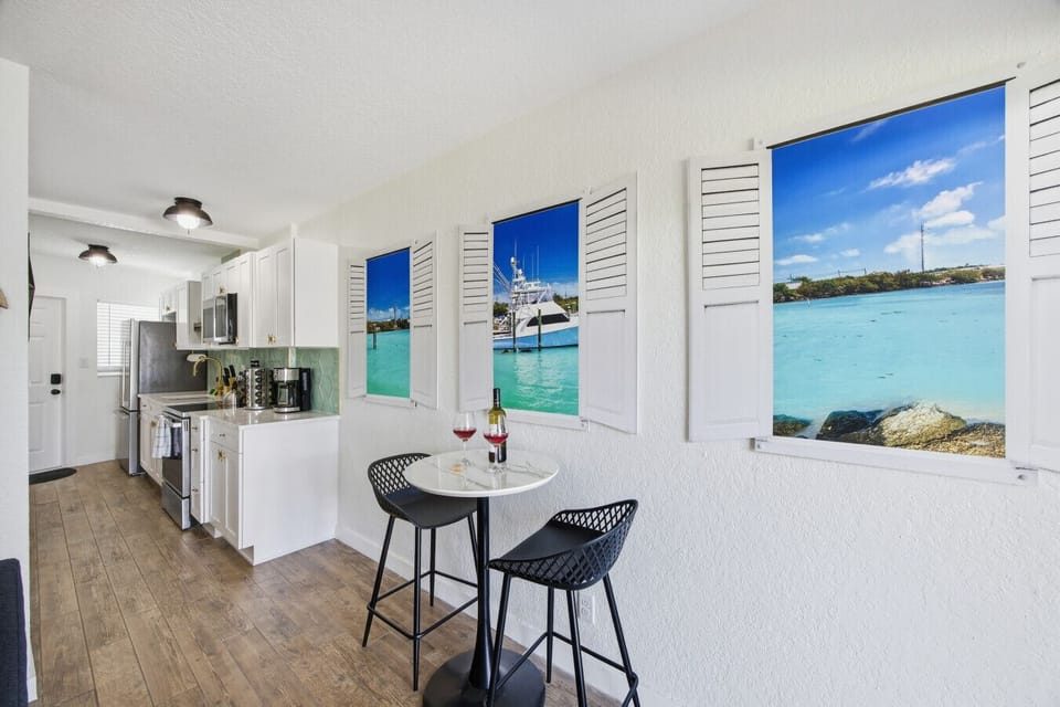 Kitchen: Bright and airy space with `ocean views`, perfect for culinary adventures and cocktails!