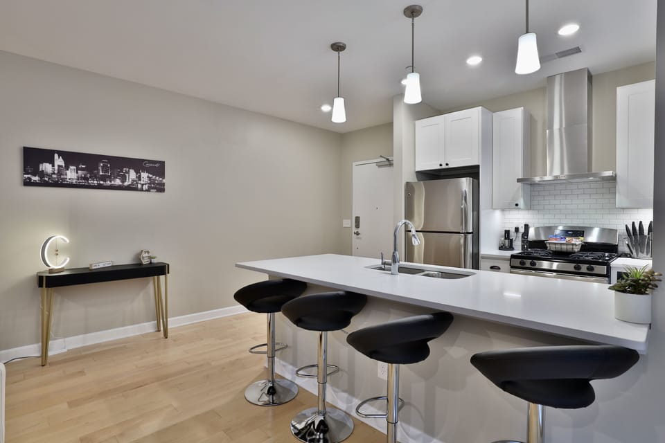 kitchen island with adjustable bar stools