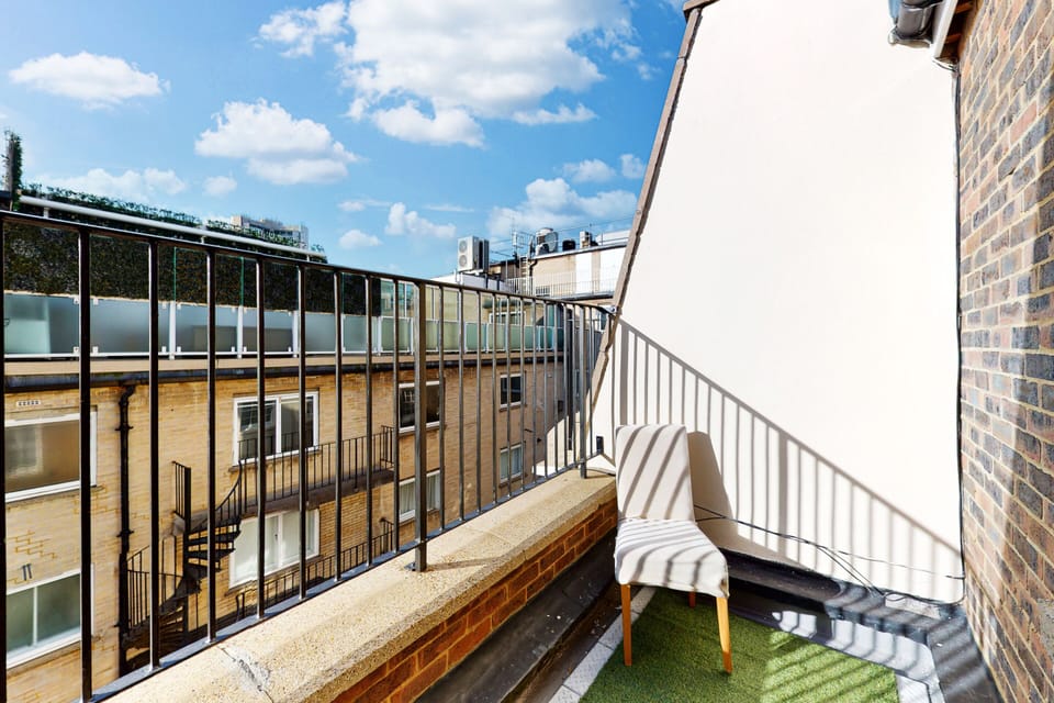 Private balcony with rooftop views