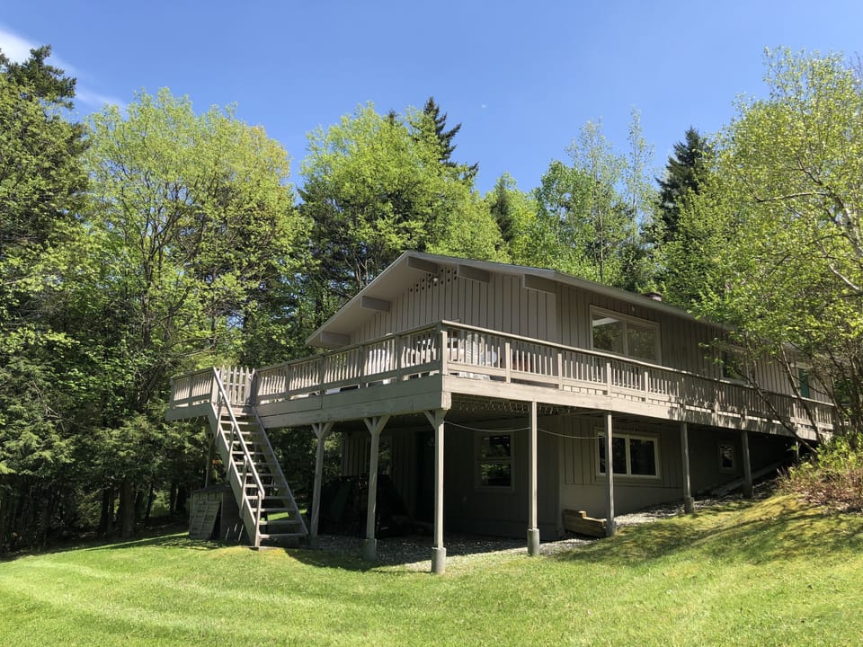 2 level chalet with deck overlooking golf course with views of the valley