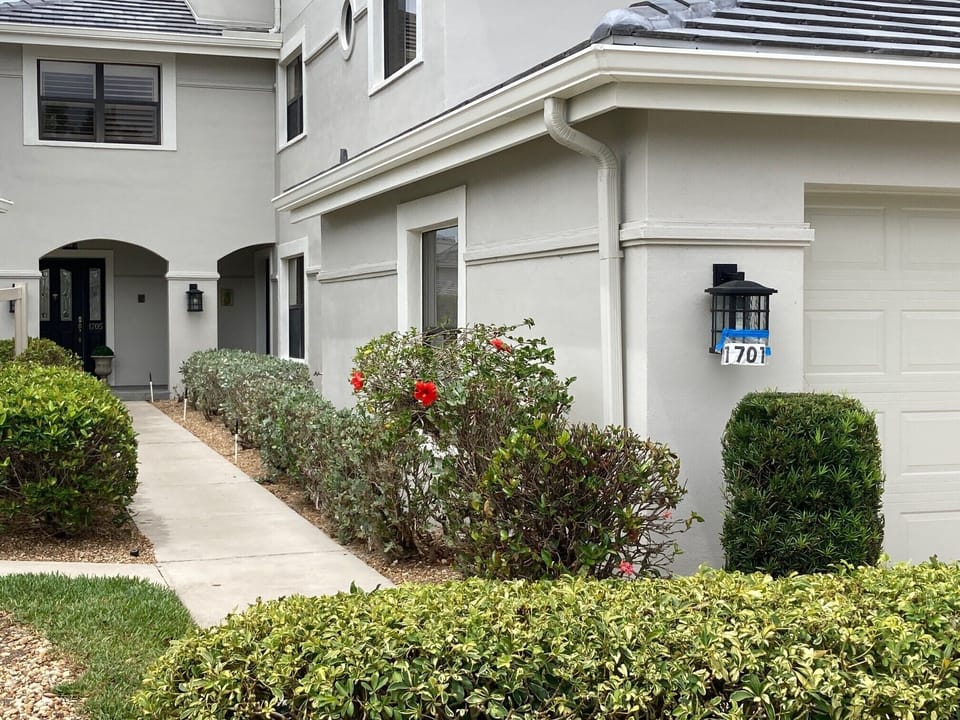Attached  2 car Garage, sidewalk leads to front door