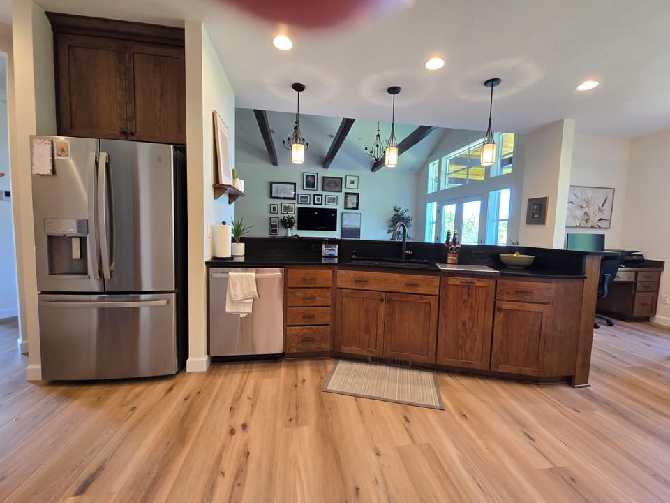 Large refrigerator dispenses crushed/cubed ice and water at your fingertips