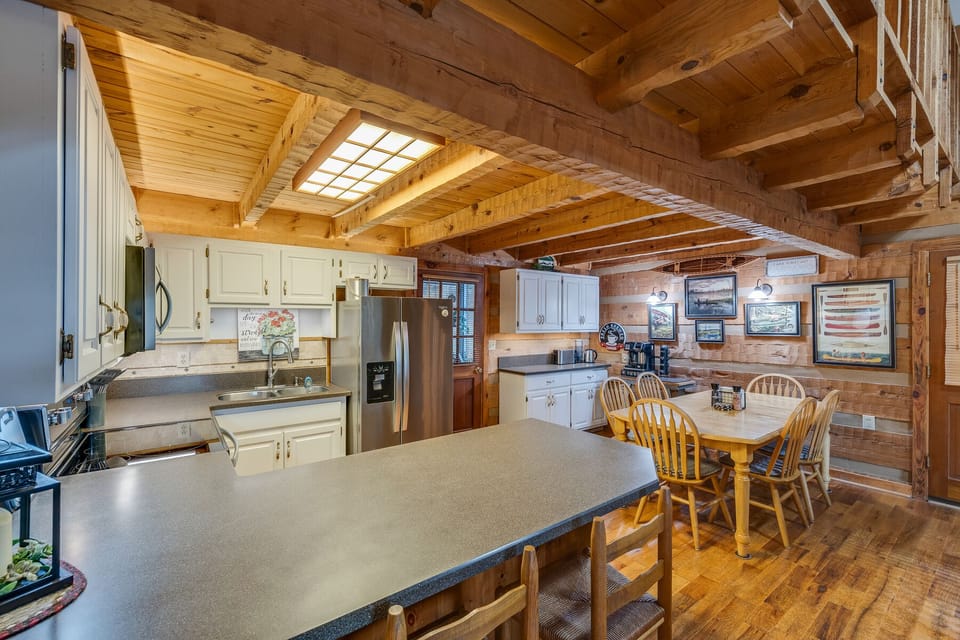 There is a kitchen bar and dining area where you can enjoy your meals!