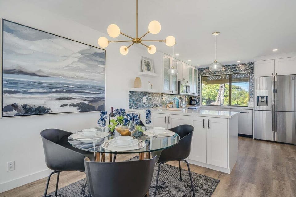 Share meals in dining spaces bright with art and kitchens.
