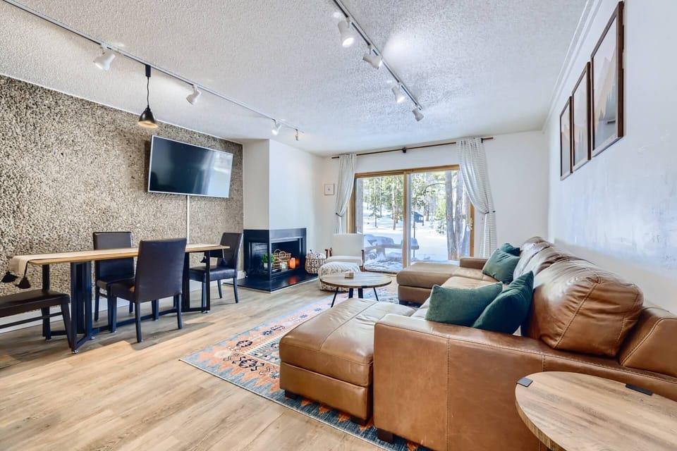Spacious Open Layout with Tons of Seating, Lovely Forest View & Decorative Fireplace (no fires permitted)