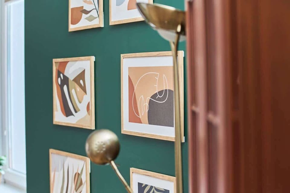 A close-up of the bedroom decor with small artistic touches creating a welcoming vibe.

