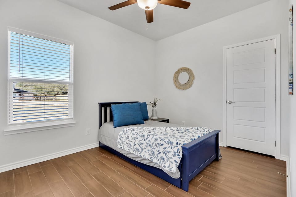 Third bedroom with a trundle bed