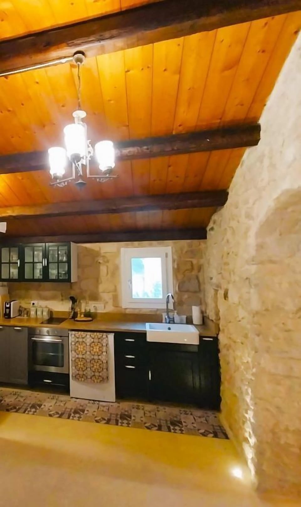 Kitchen cooking area with window chandelier