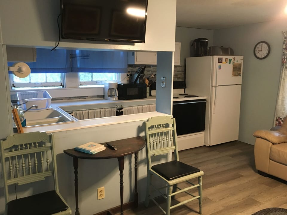 The kitchen is beautifully tiled and is equipped with most everything you need. 