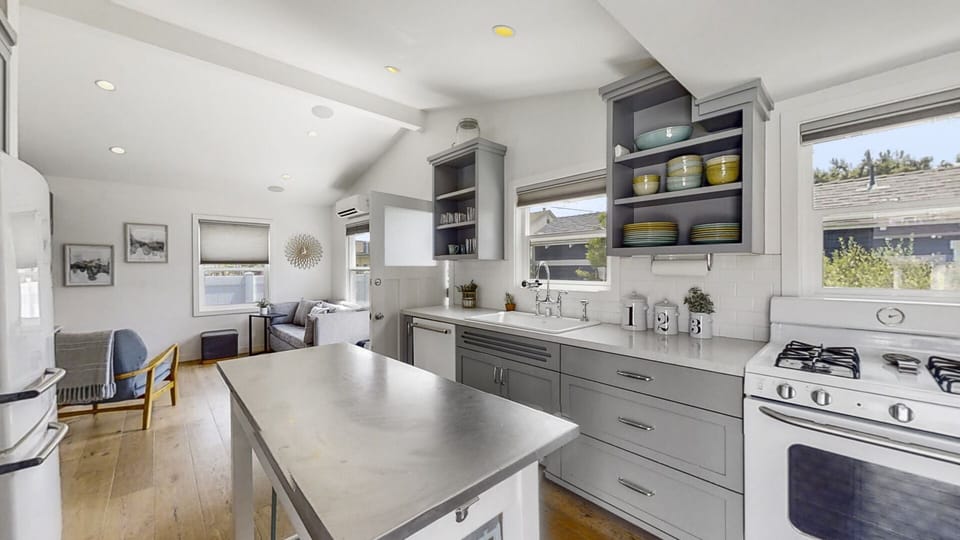 Full kitchen with view into living area