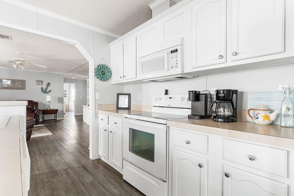Bright, airy kitchen with modern appliances and open layout