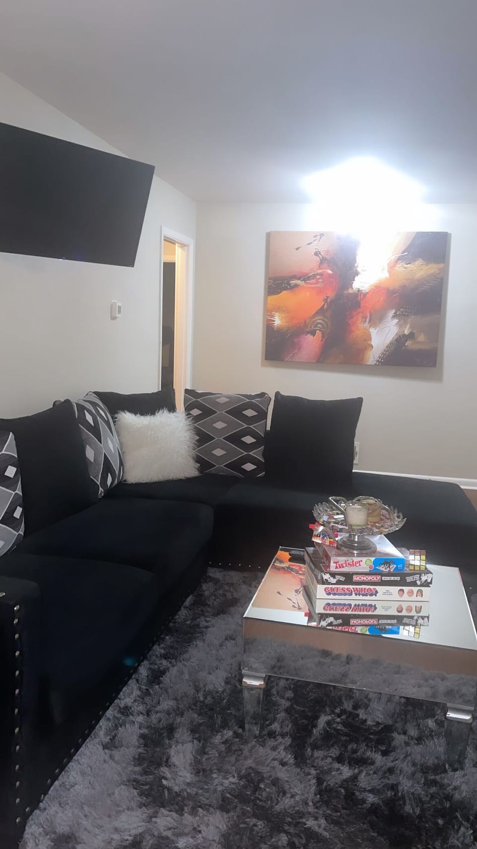 Enjoy games watch TV or just relax in a spacious livingroom with tons of pillows