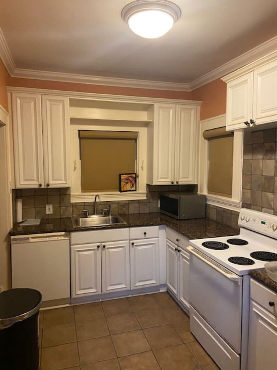 Full size with refrigerator and freezer. Electric cooker and oven 