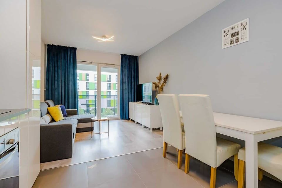 An elegant dining space with a table and chairs, ideal for shared meals or gatherings.