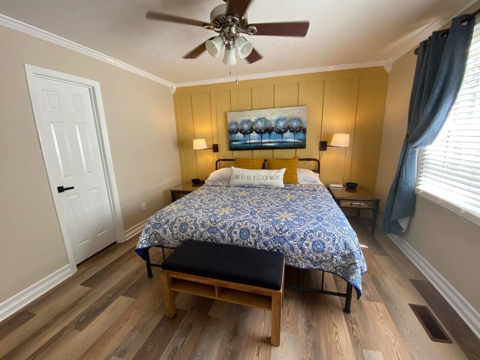 KING BED. Front bedroom. Room darkening curtains. White noise machine and charging ports.