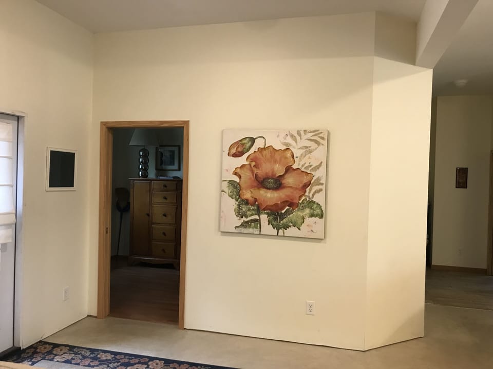 Entrance to third bedroom and hallway to the other 2 bedrooms. 