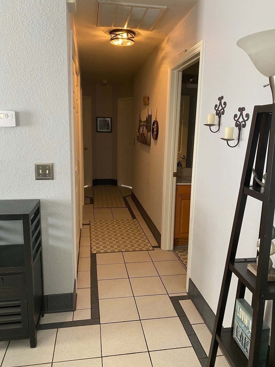 All bedrooms are located down the hallway